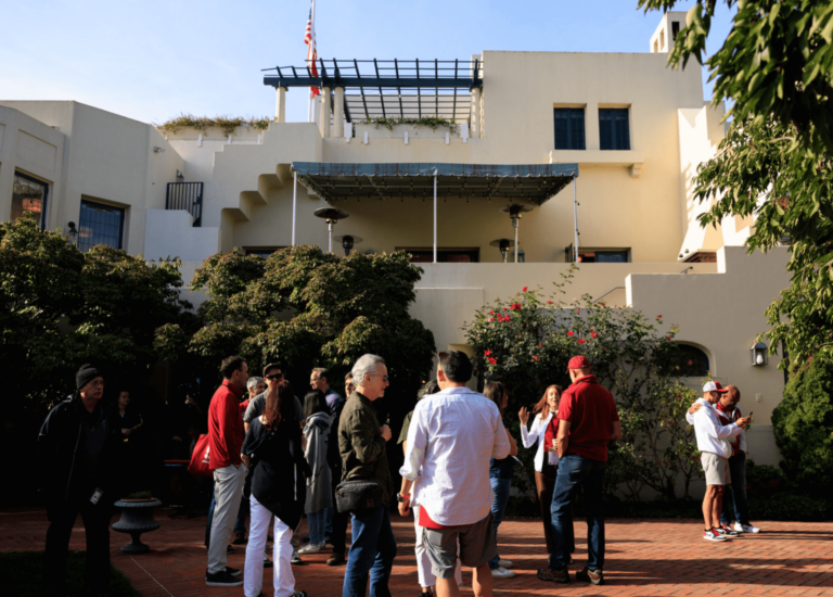 Group of people standing outside Lou Henry Hoover building