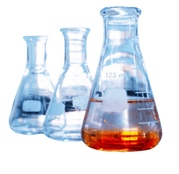 Three beakers and one with orange liquid