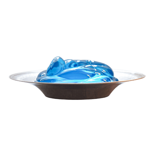 Small metal dish with blue jelly inside
