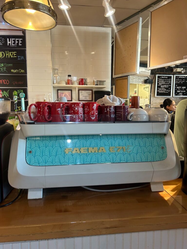 Mugs placed on top of the counter at Coho cafe